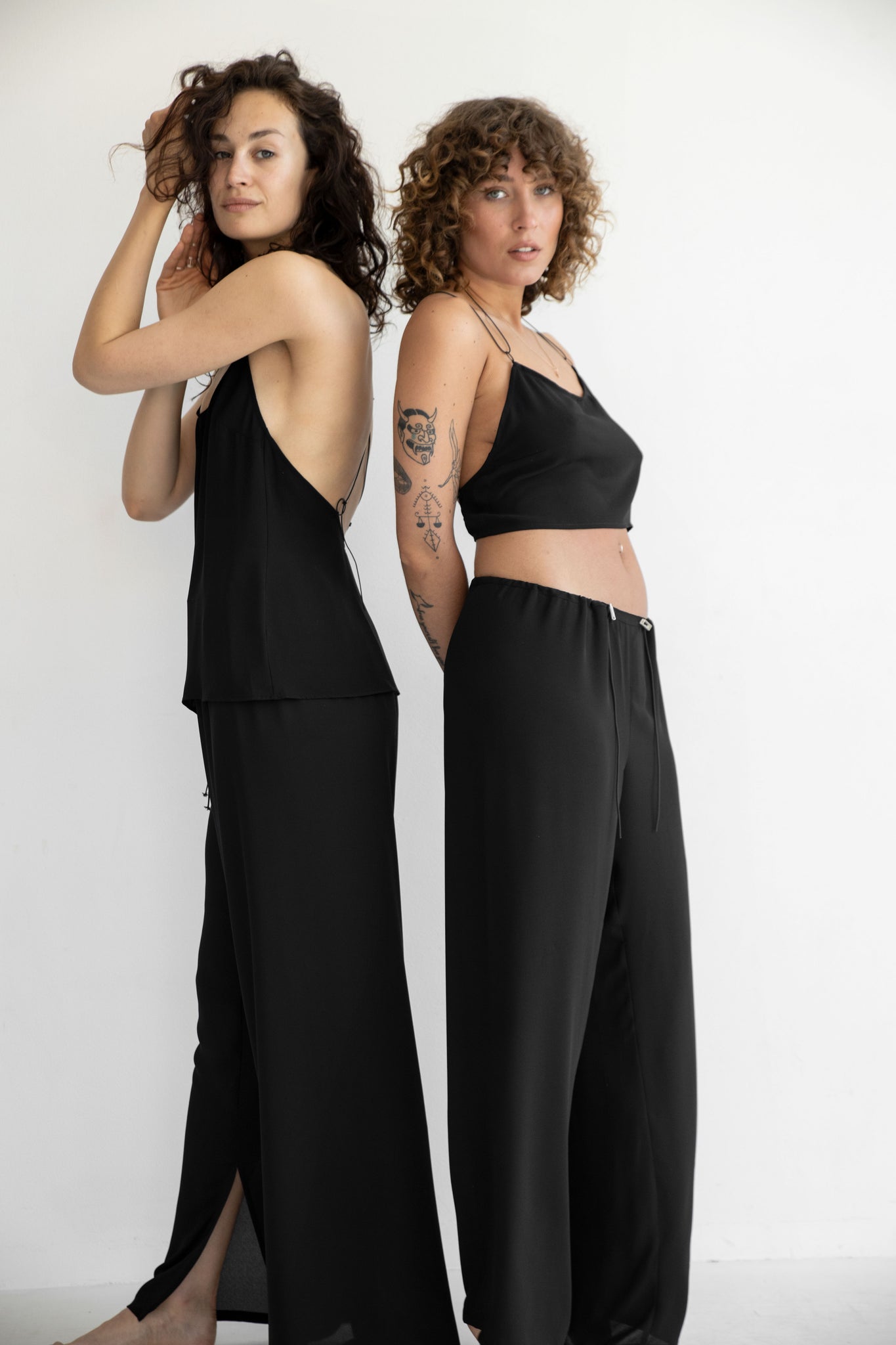 Loose fit open back slip top black
