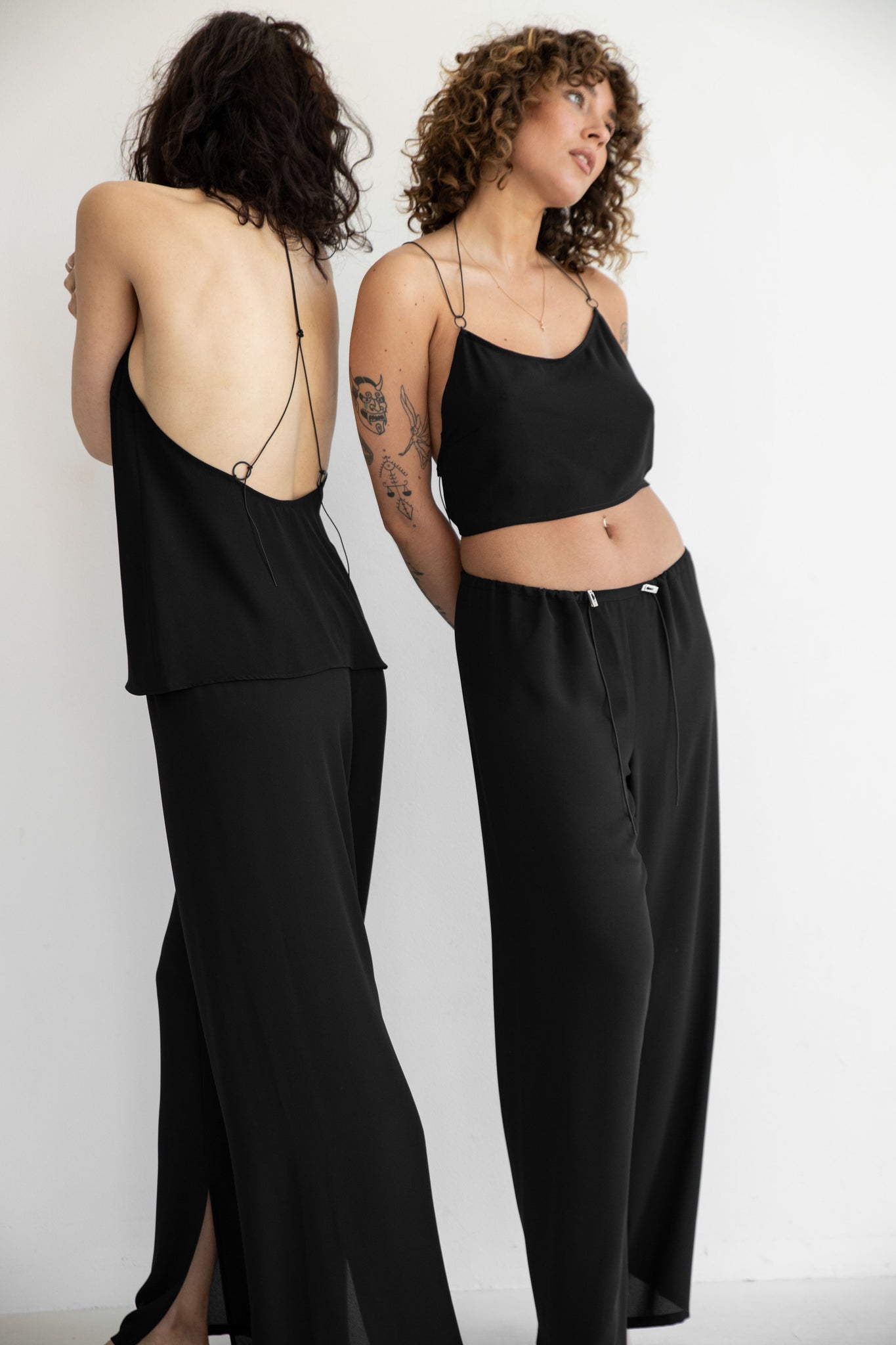Loose fit open back slip top black