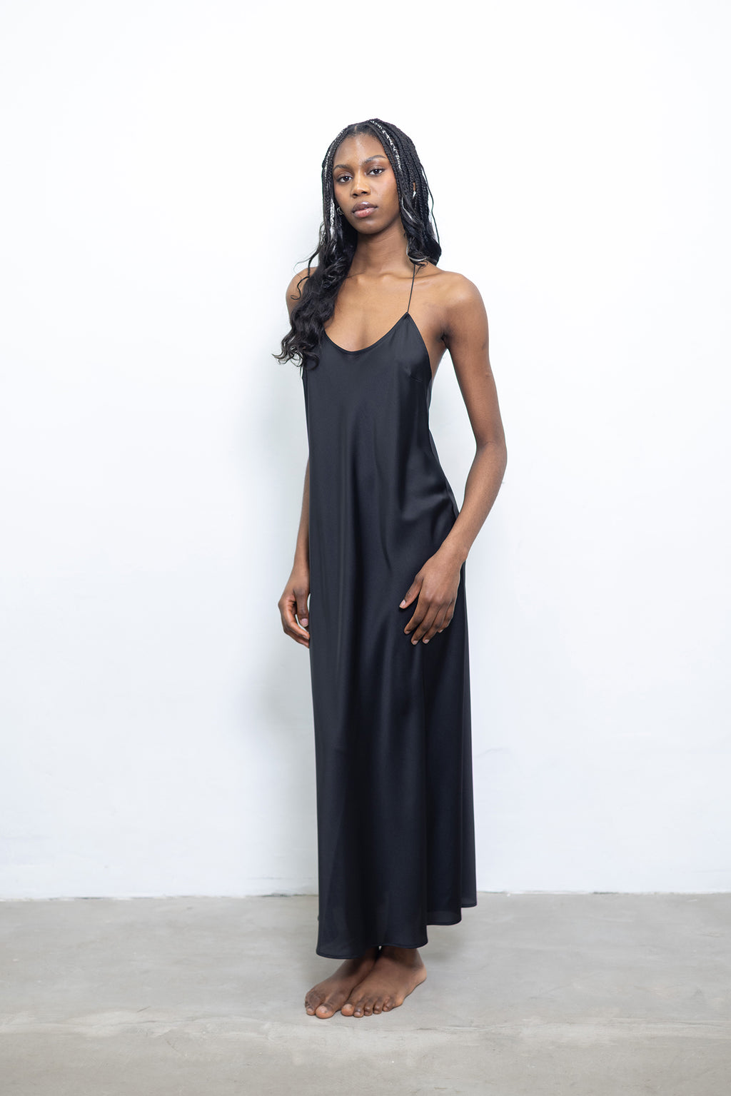 The Liquid Black Slip Dress