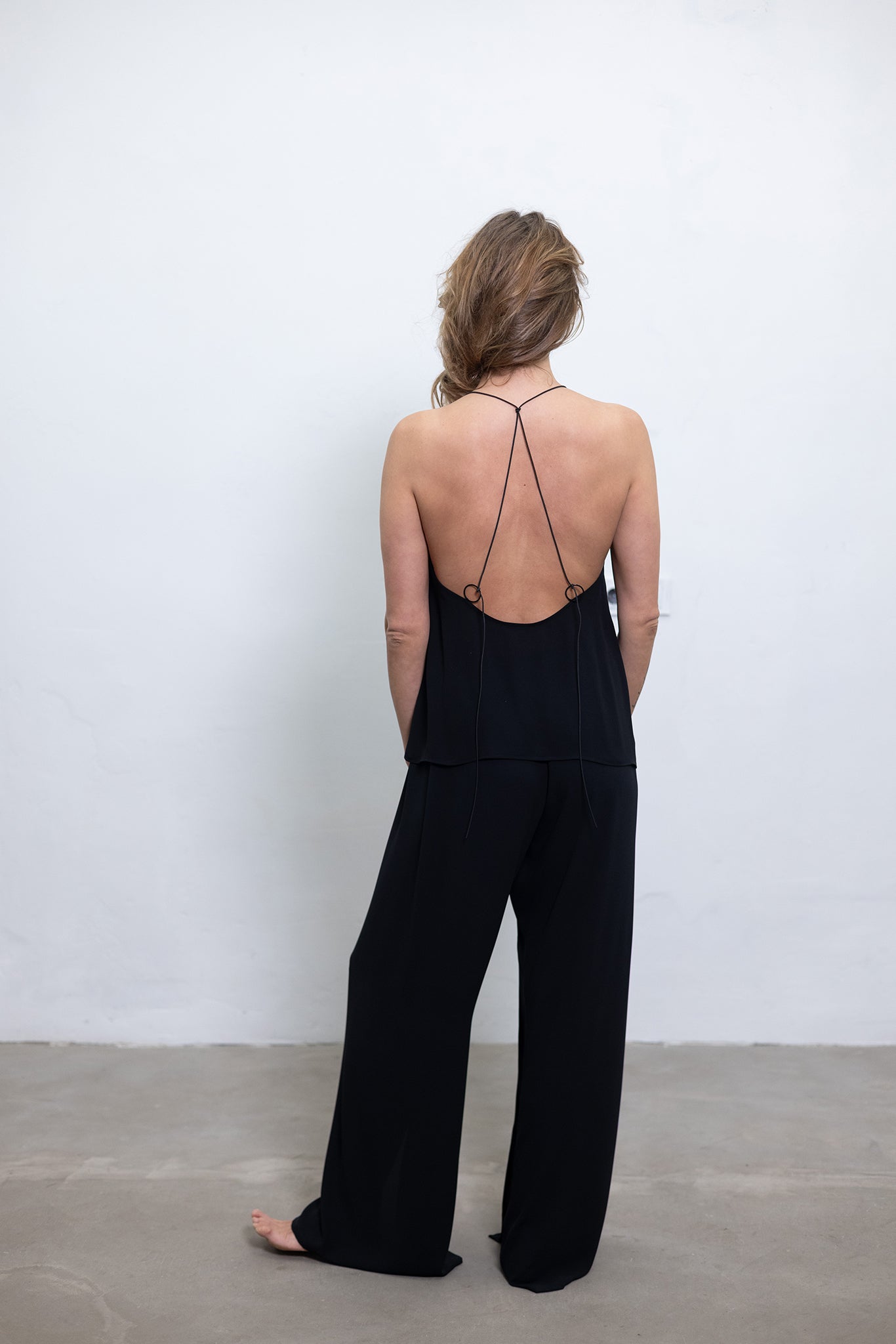 Loose fit open back slip top black