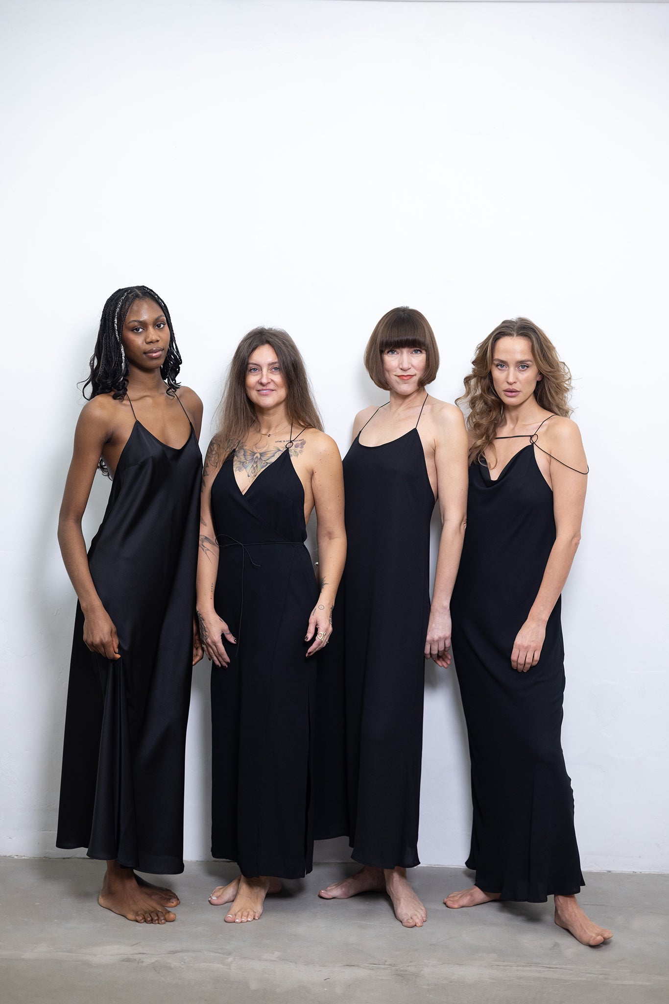 The Liquid Black Slip Dress